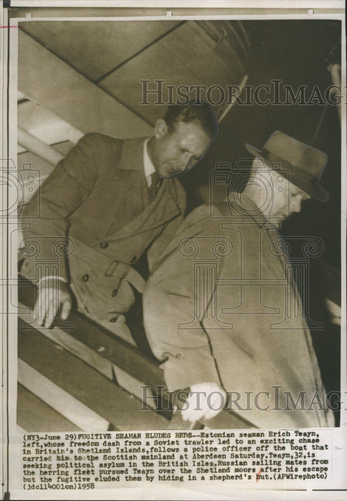 1958 Erich Teayn Seaman Fugitive escorted by police officer. - Historic Images