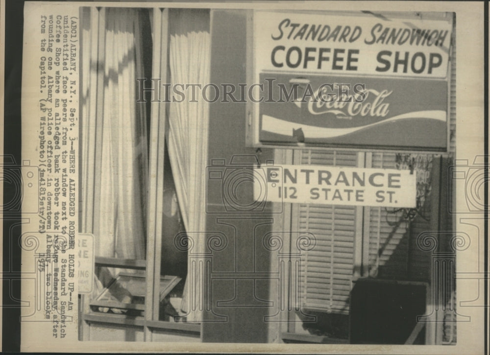 1975 Someone watching bank robbery in Albany Ny  - Historic Images