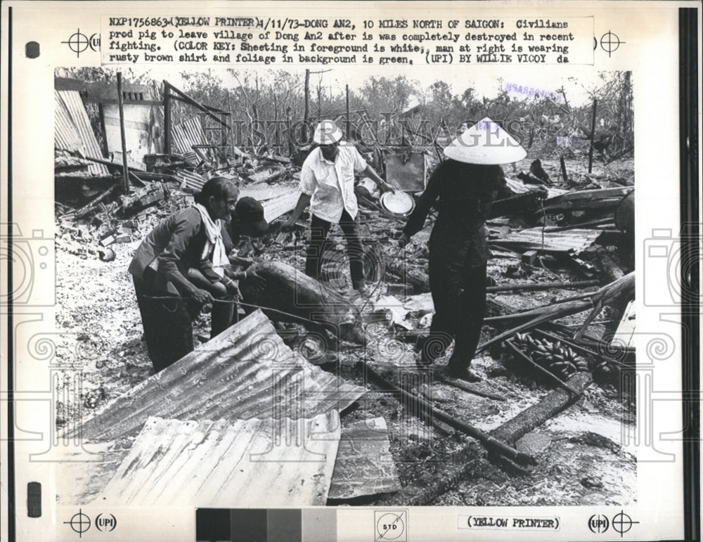 1973 Cleaning up after firefight in village north of Saigon - Historic Images
