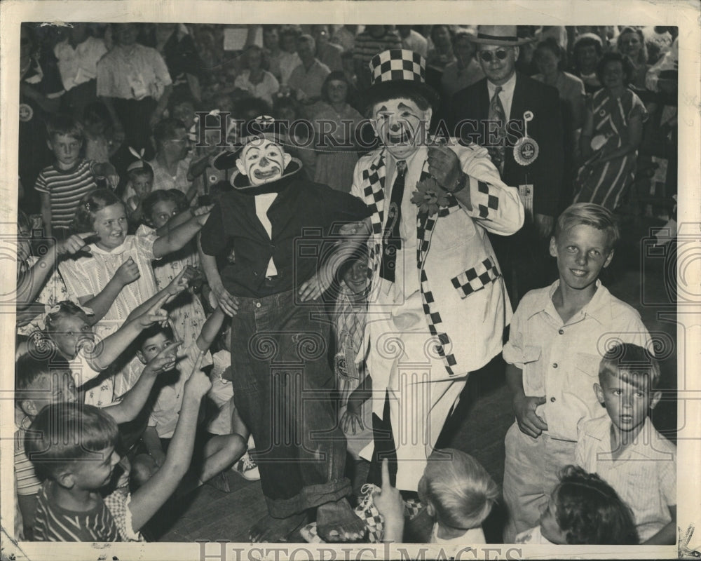 1948 Robert Wolf, 12, gets to be clown for a day - Historic Images