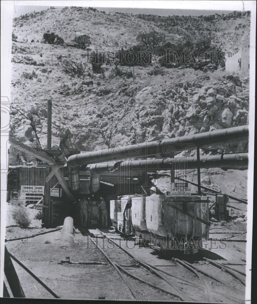 1961 Workman prepare to enter tunnel at Neveda atomic testing site - Historic Images