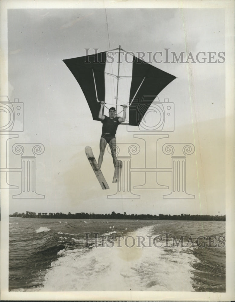 Florida sportsman demonstrates water skiing augmented by a hoisting - Historic Images