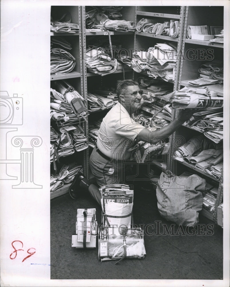 1963 Postman E. M. Natter Stacks Mail Until Recipients Return Home - Historic Images