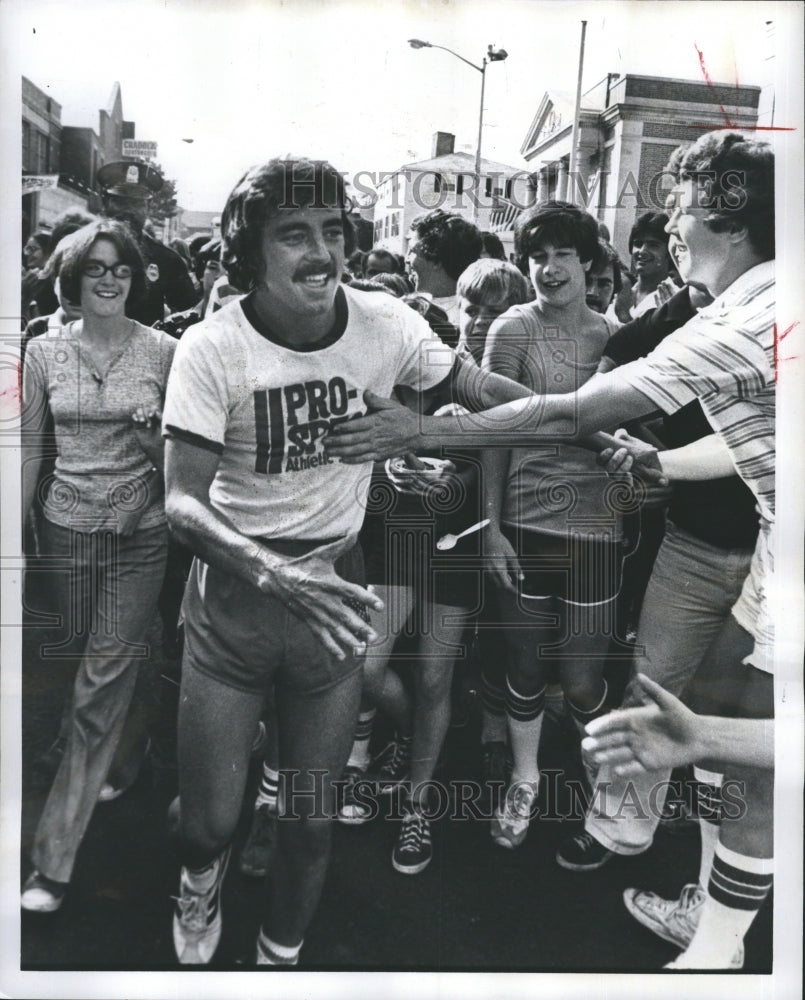 1978 Dave McGillvray of Medford is greeted on completing  run .-Historic Images