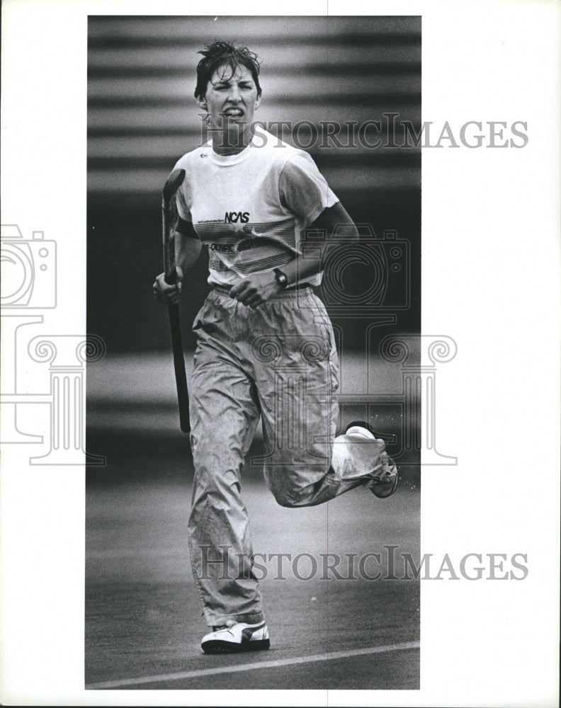 1988 Beth Beglin hustles across the field.  - Historic Images