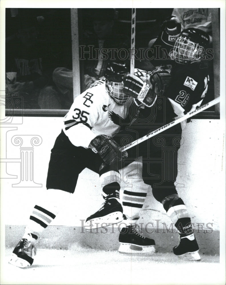 1994 BC #35 Peter Masters checks Merrimac #28 Ziggy - Historic Images