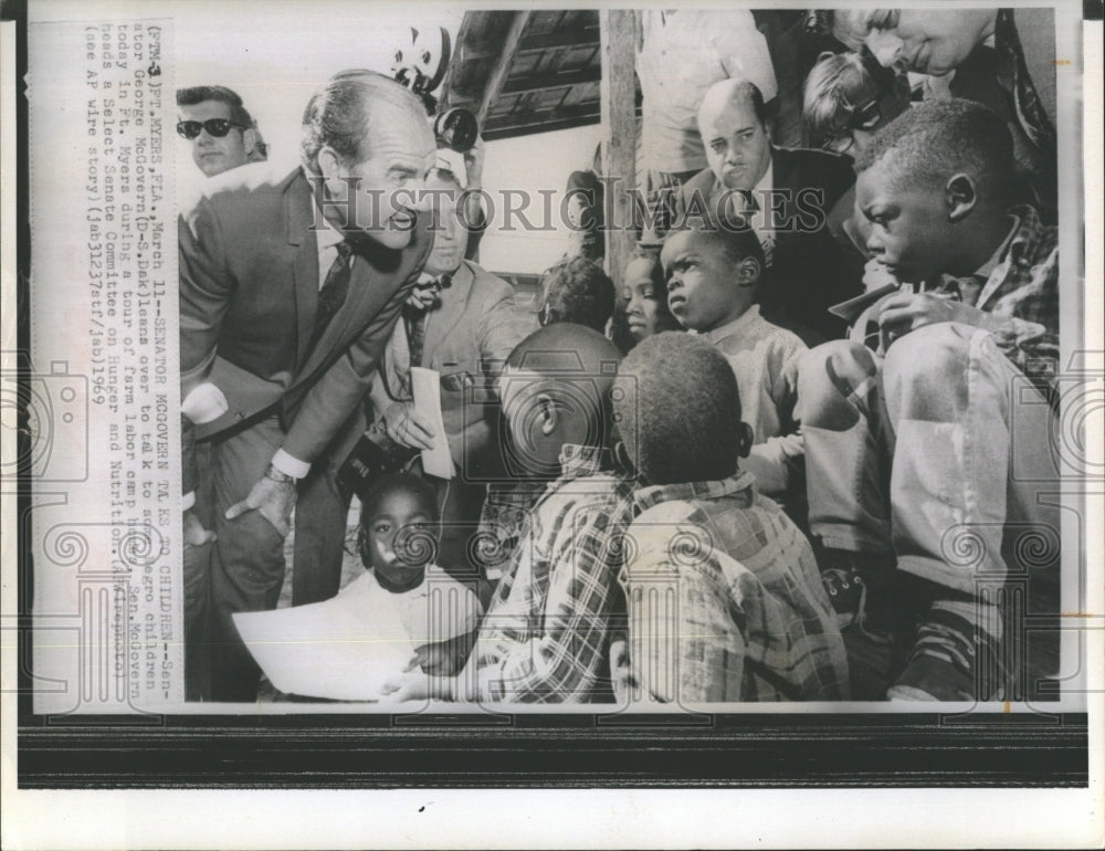 1969 Senator George McGovern (D-S. Dak) talks to youngsters at - Historic Images