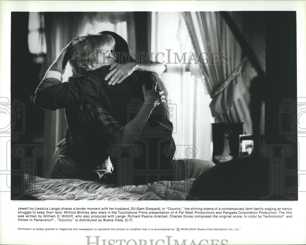 1984 Actress Jessica Lange and Sam Shepard, on set, &quot;Country&quot;. - Historic Images