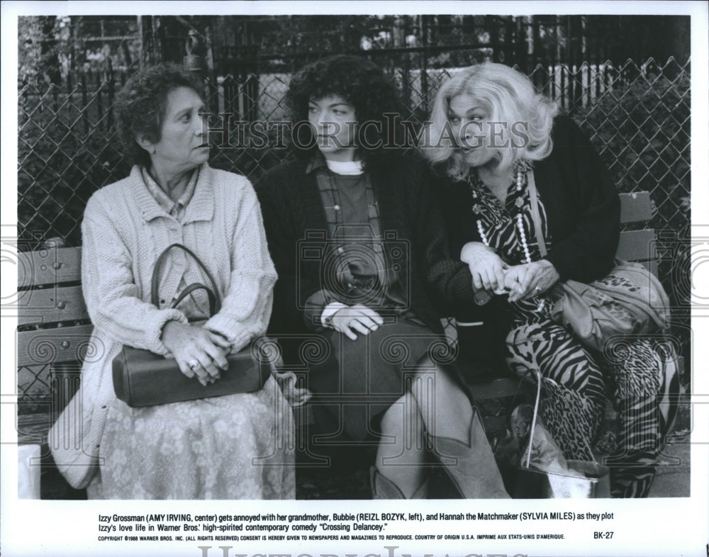 1988 Izzy Grossman (Amy Irving, center) gets annoyed with her - Historic Images