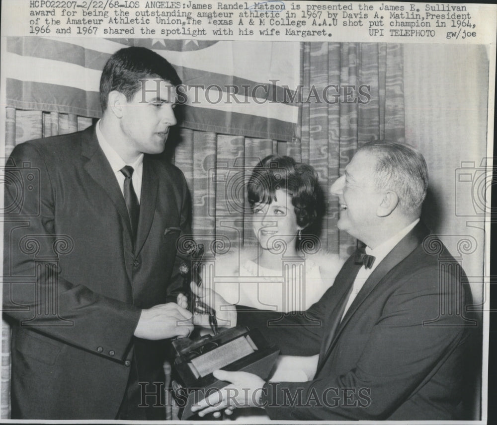 1968 James Matson receives the James Sullivan Award for being the - Historic Images