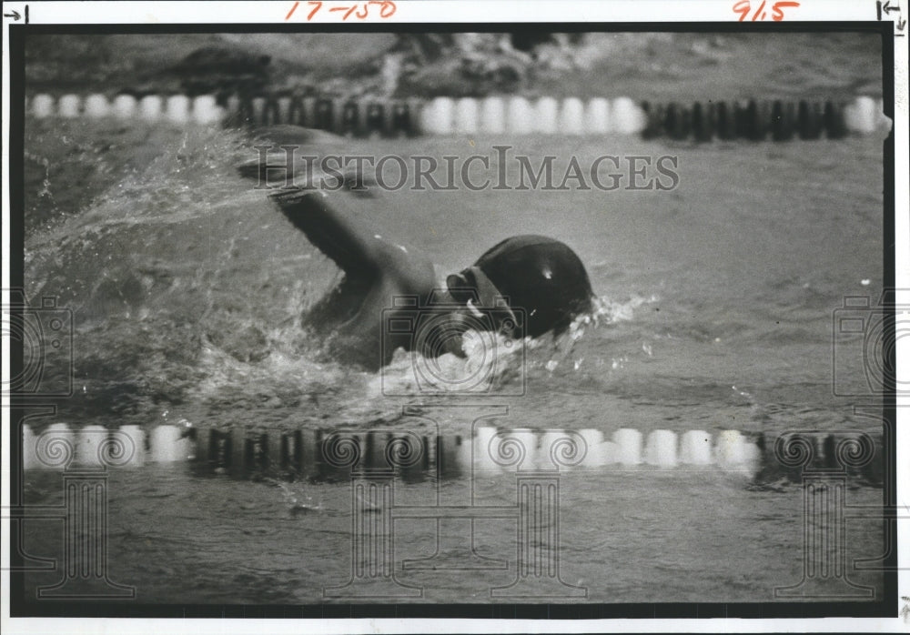 1981 Eric Johnson glides through water at Largo pool  - Historic Images
