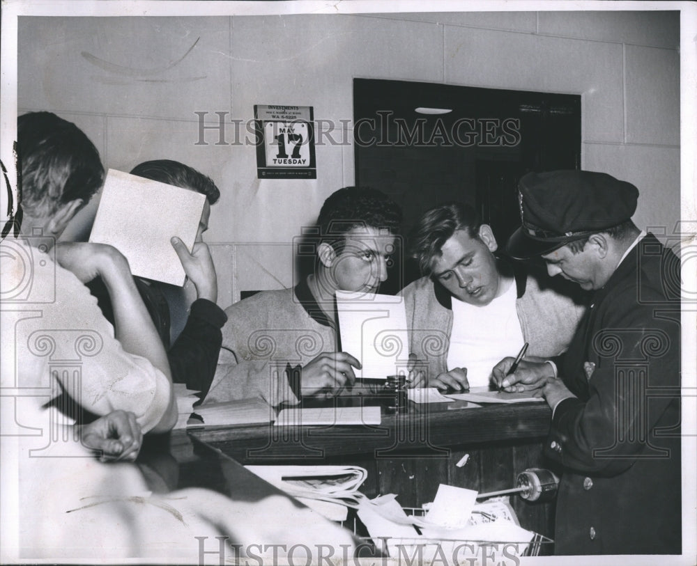 1955 Kids being booked at Connor Station after Gang fight - Historic Images