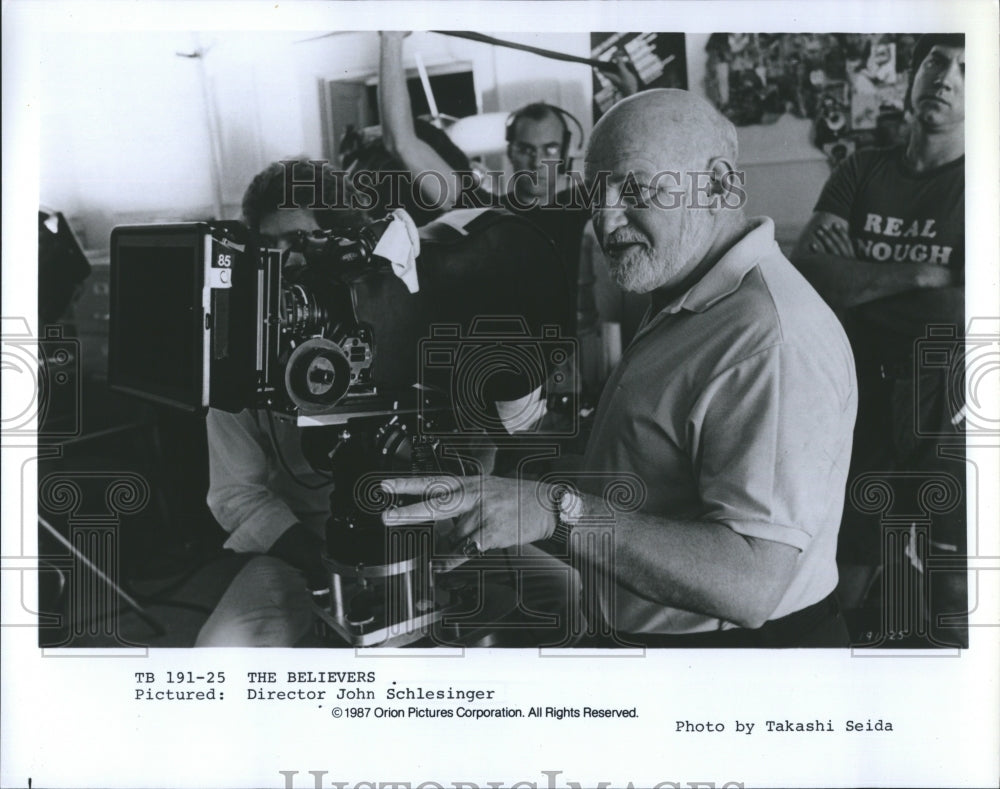 1987 Director John Schlesinger on the set of &quot;The Believers&quot; - Historic Images