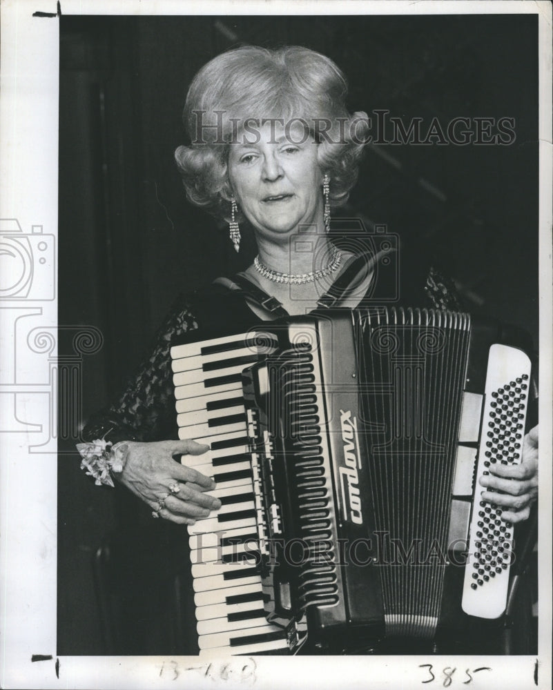 1977 Miss Dolly Playing Occordian  - Historic Images