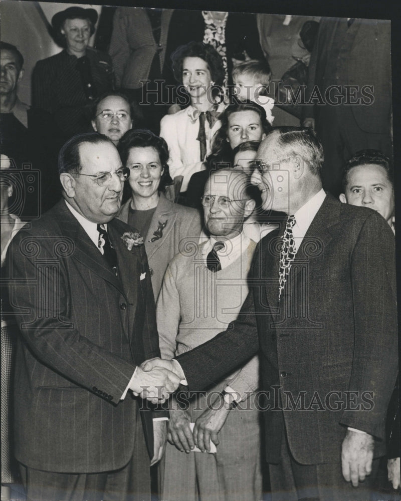 1948 Pres. Jerome Waterman greets Realtor J.Hervey Mann Jr. - Historic Images