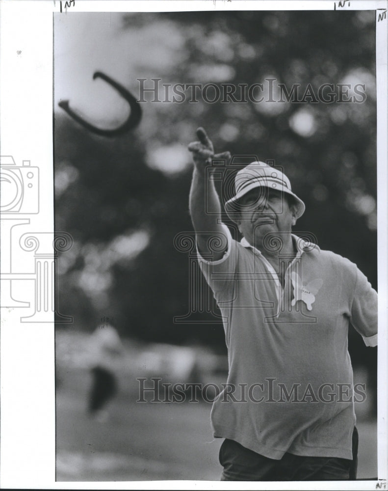 1989 Senior Fun Day shooting horseshoes - Historic Images