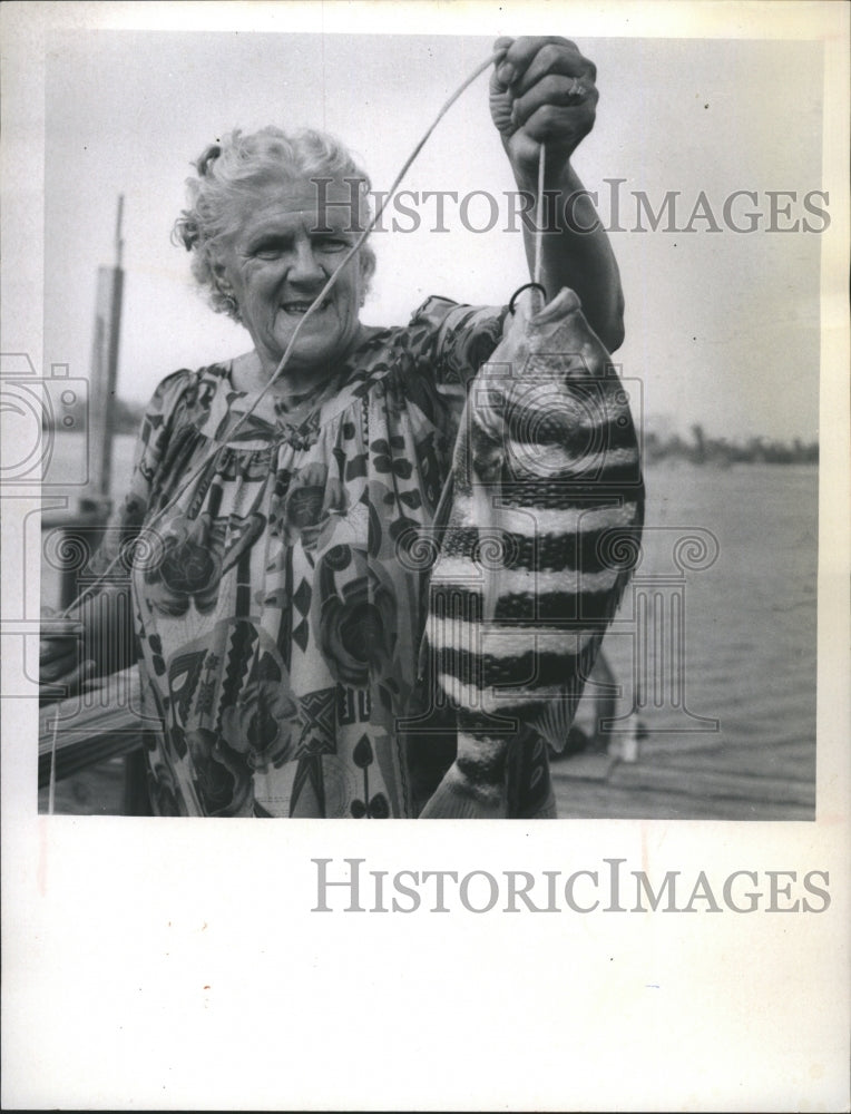 1973 Margaret Myles shows her sheepshead fish  - Historic Images