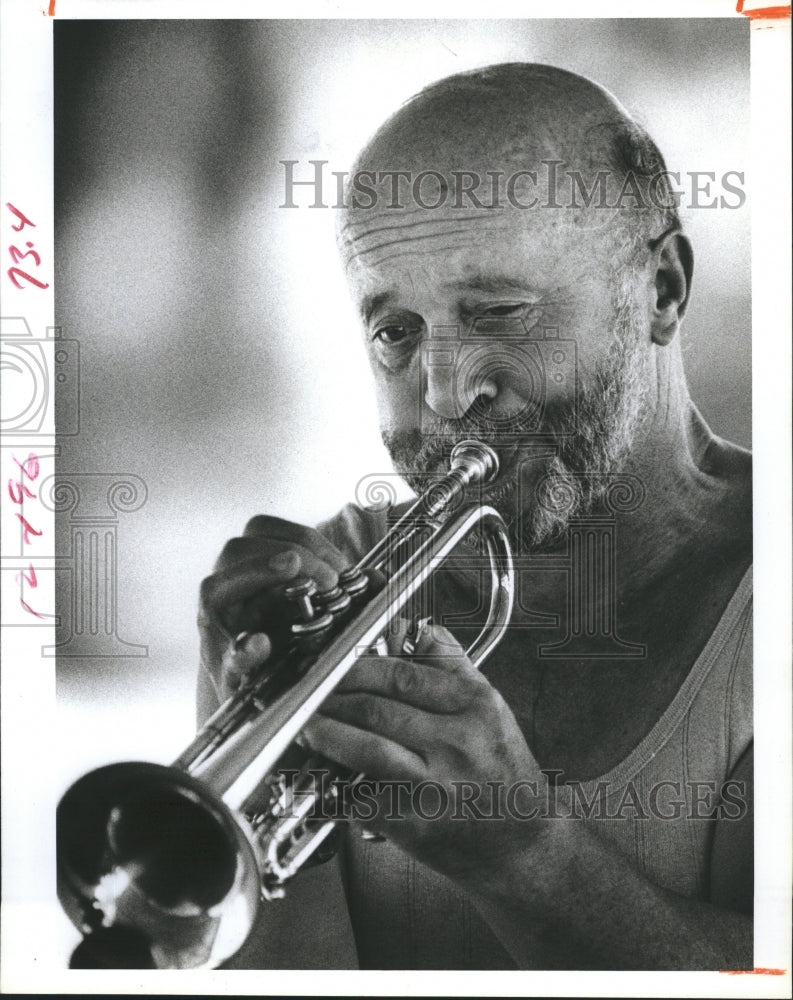 1986 Joe Mento plays the trumpet - Historic Images