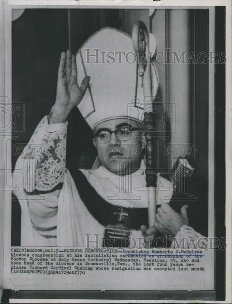 1970 Arcbishop Humberto S. Medeiros blesses congregation. - Historic Images