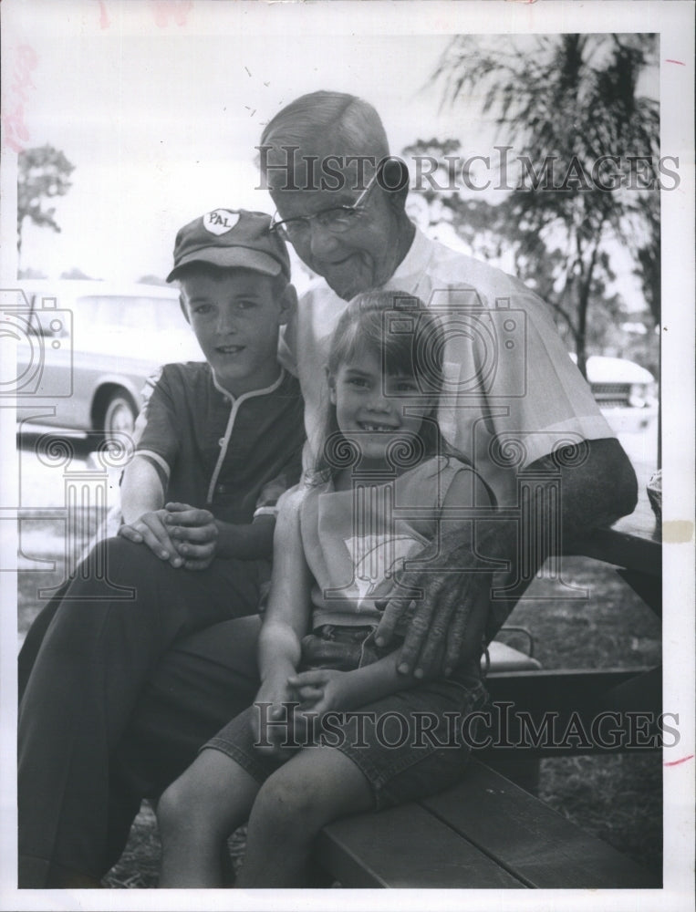 1966 Steve & Beverly Kelly with grandfather L.D. Patterson - Historic Images