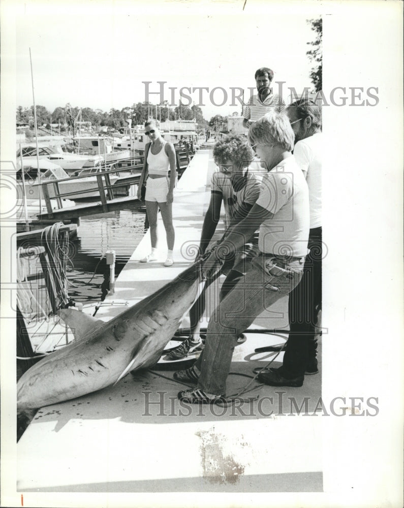 1983 Bill Griswald &amp; Steve Arnold of Spring Hill pull a 276 pound - Historic Images