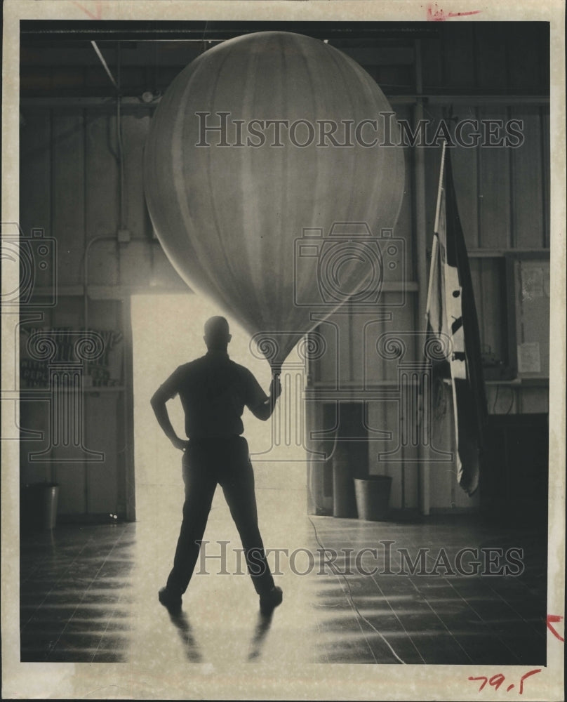 1965 William A. Smith of Florida poses with a balloon at the - Historic Images