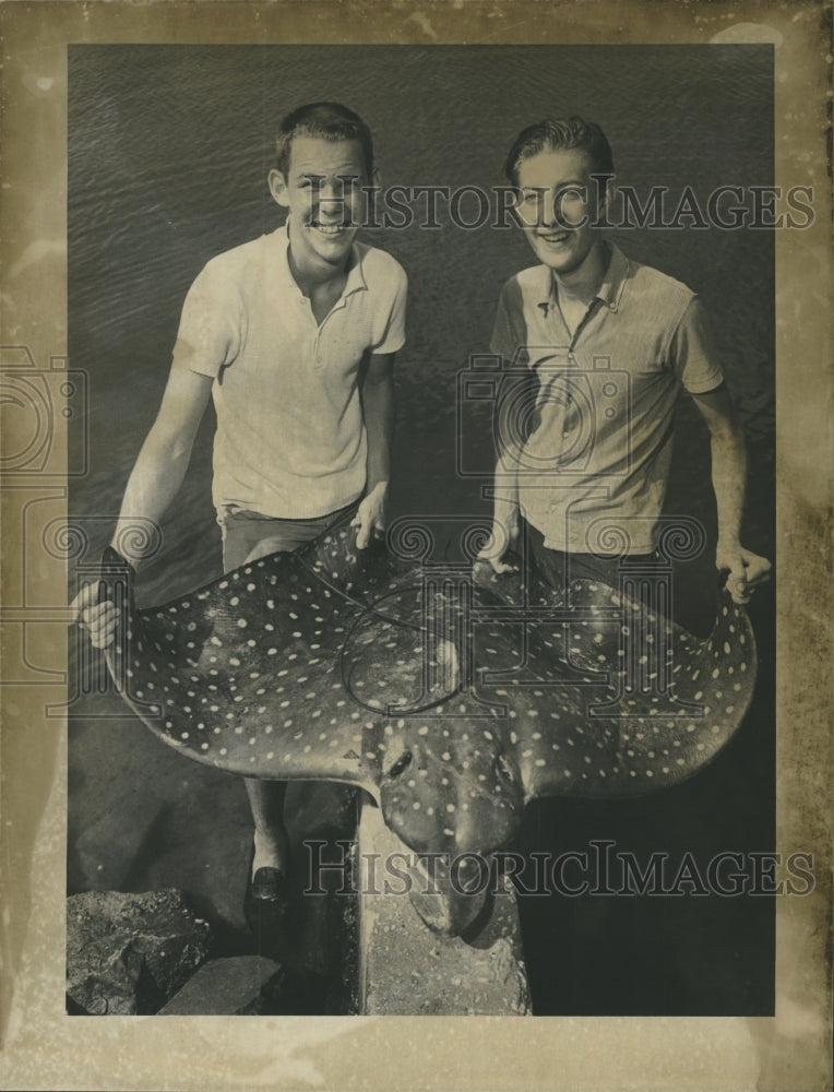 Ken Holtscaw and Jim Weatherby with the leopard ray they caught - Historic Images