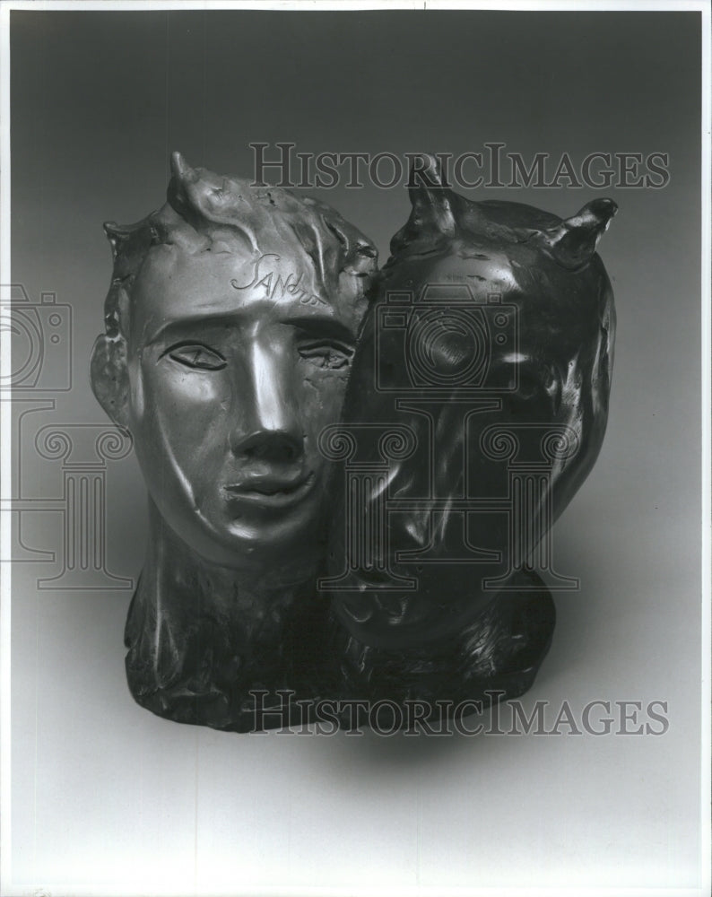 1994 Press Photo Sculpture Of Two Heads In Bronze - Historic Images