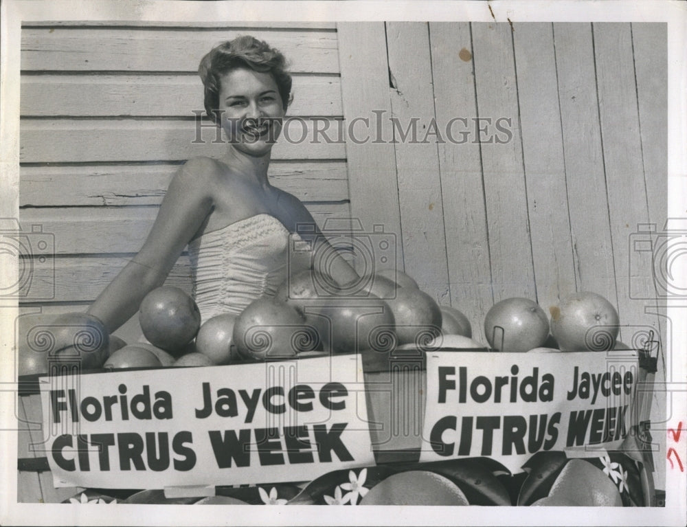1956 Edith Jackson modeling for advertisement for Jaycee Citrus - Historic Images