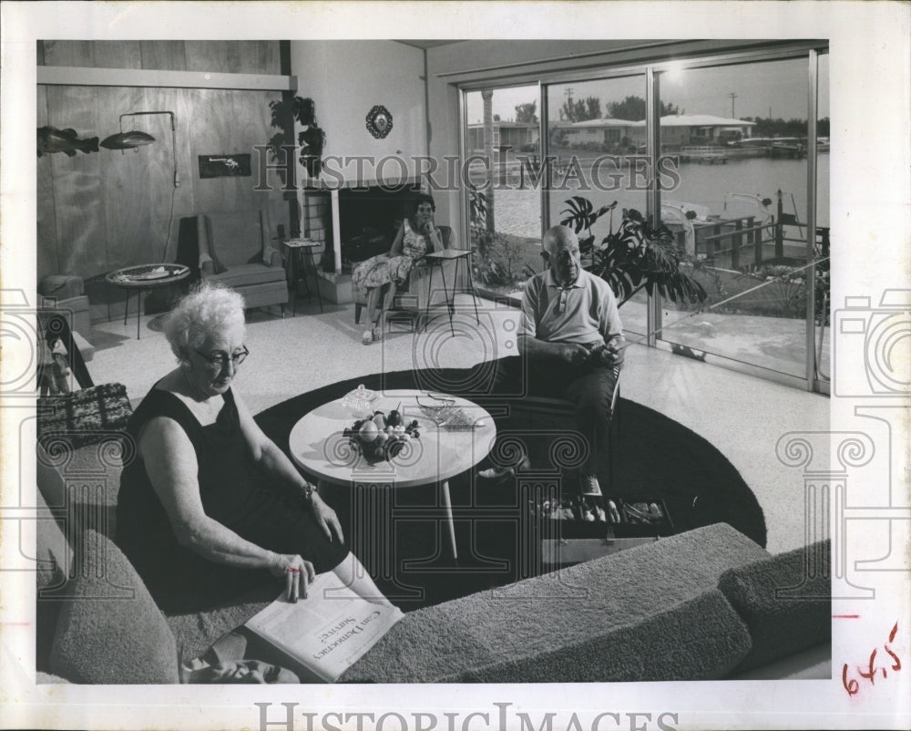 1960 Mr. and Mrs. Frank Rauch in their spacious living room - Historic Images