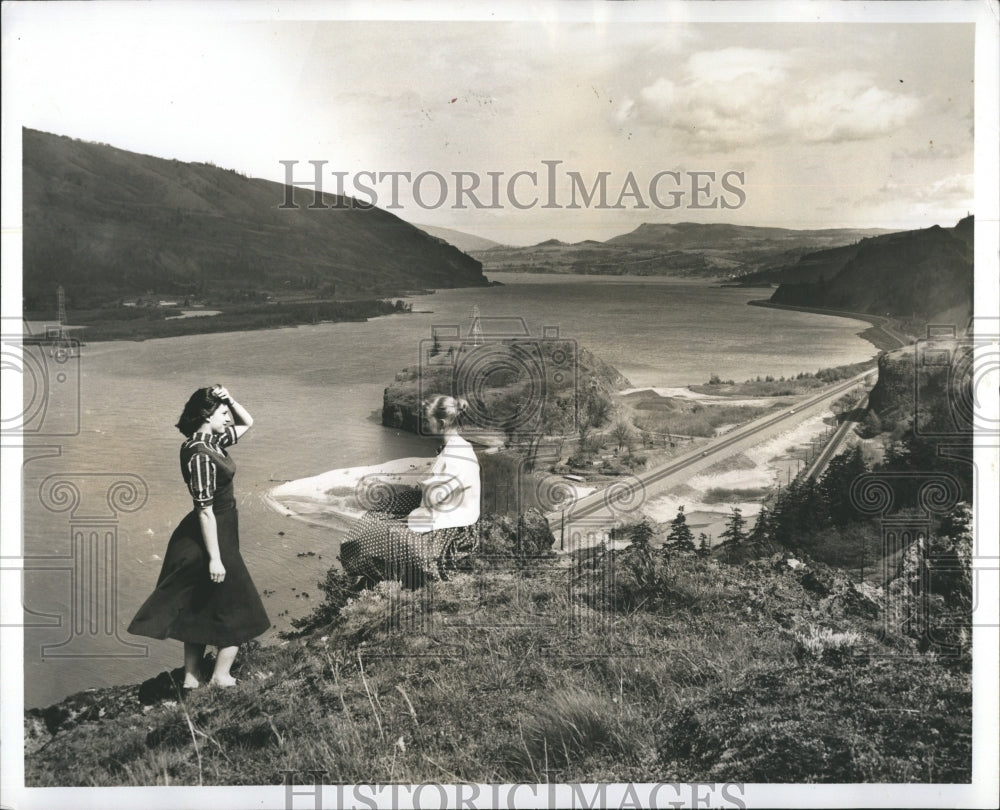 two women sight seeing over the place  - Historic Images