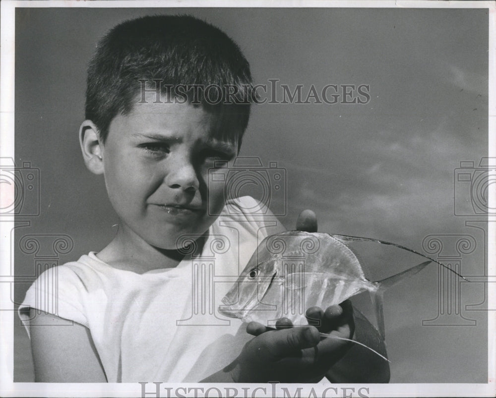 1964 Charles Scott holding a rare Lookdown fish - Historic Images