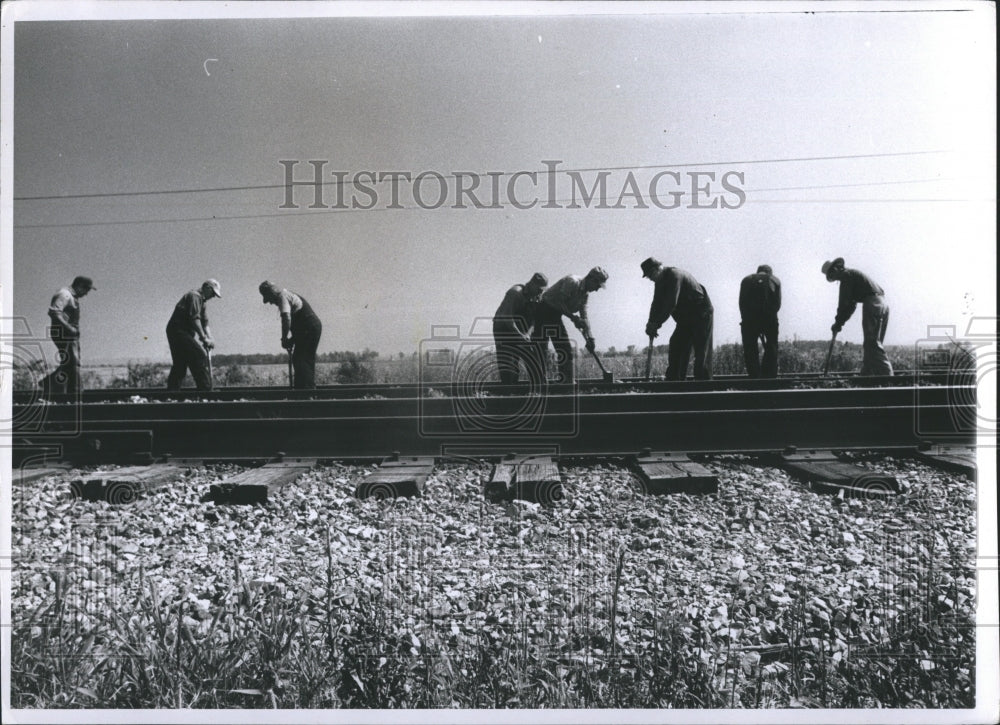 1970 People working on the railroad - Historic Images