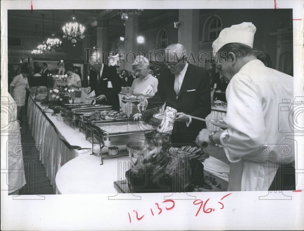 1969 Man serving food at Science Center - Historic Images