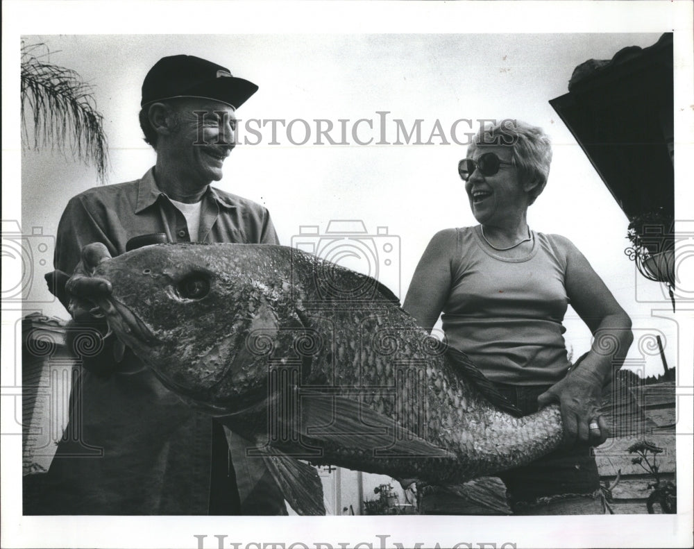 1981 John and Rita Ditulo holding their caught 45 Lb Drum - Historic Images