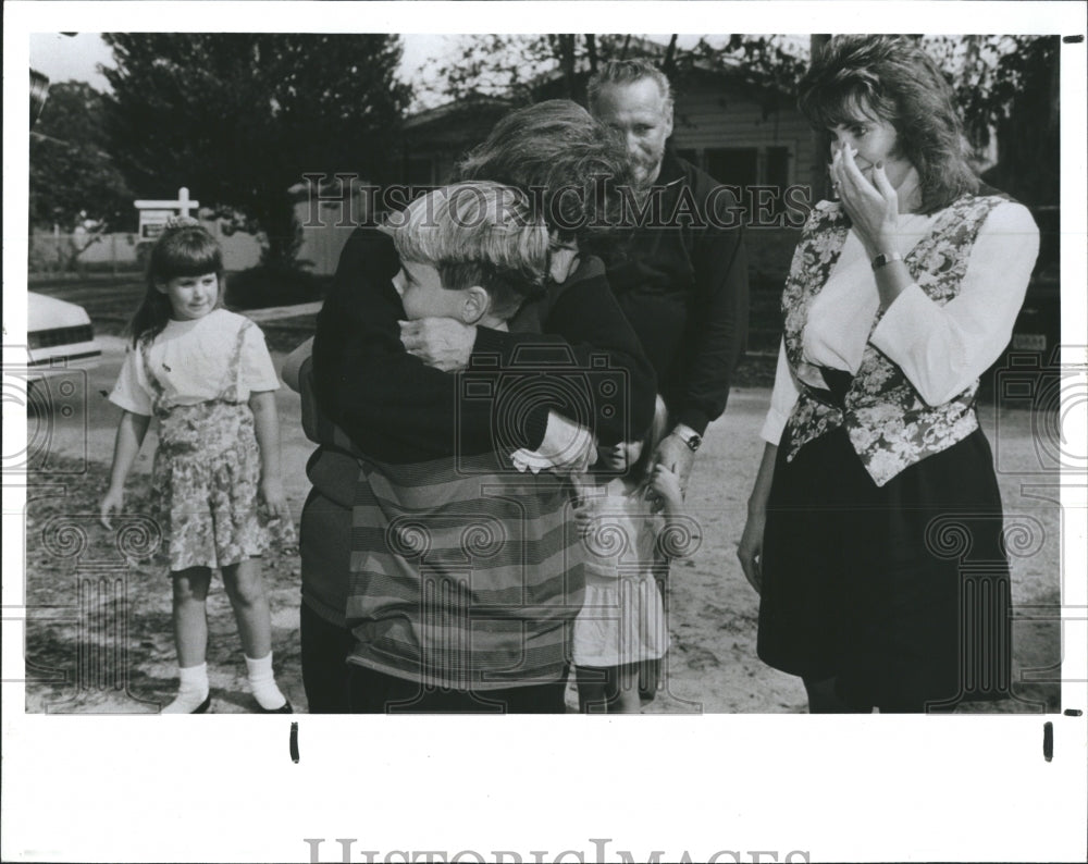 1991 Press Photo Judy Whitaker holds Robert Dean Jr her new 12yr old grandson - Historic Images