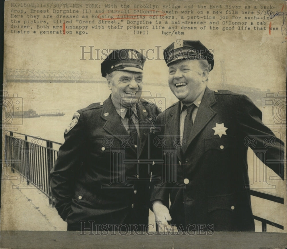 1974 Ernest Borgnine with Carroll O'Connor,actors  - Historic Images