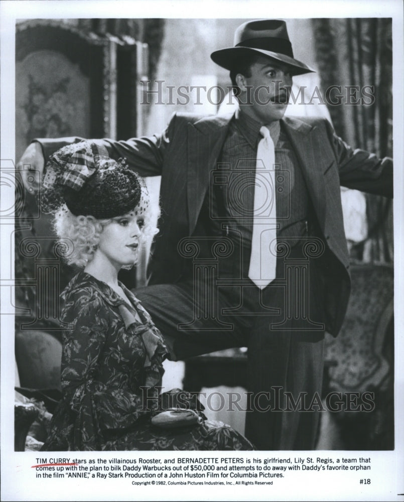 1982 Tim Curry as Rooster with Bernadette Peters in Annie - Historic Images