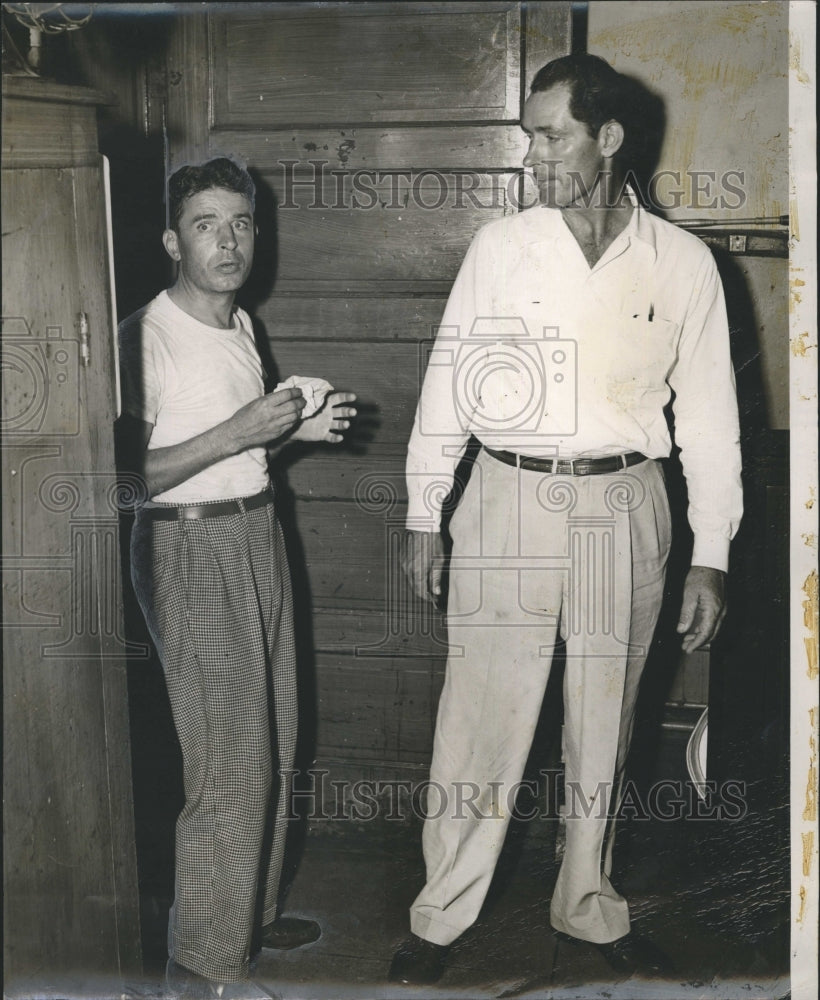 Press Photo Two men. - Historic Images