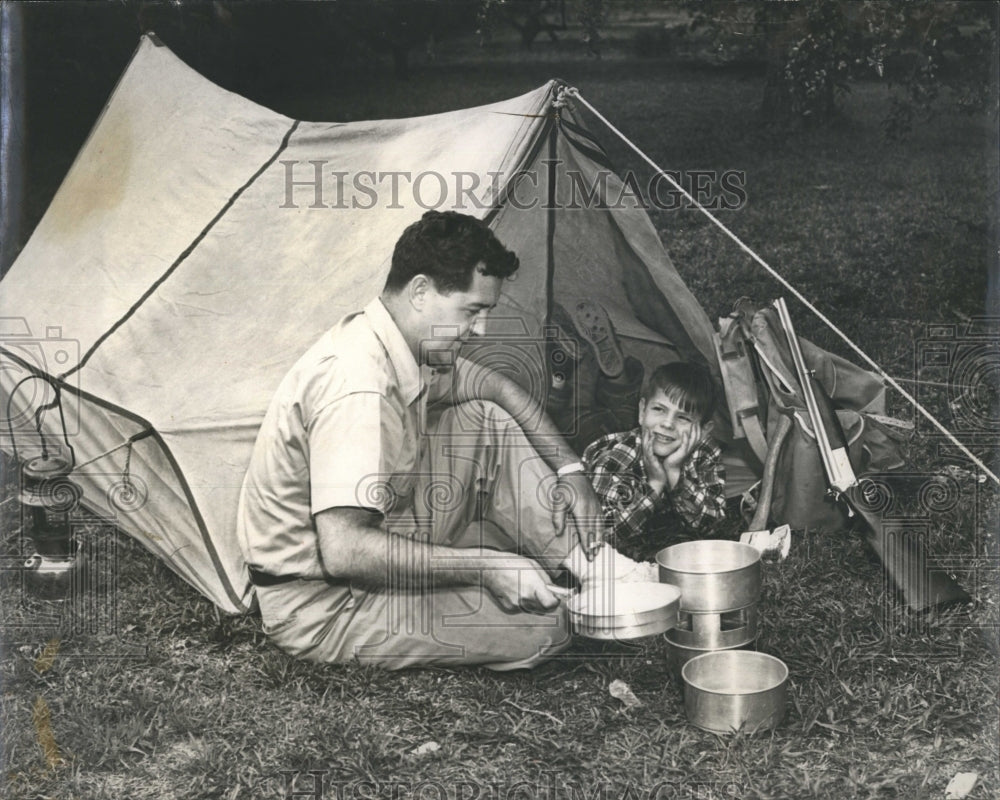 1955 Dr. W.E white Jr. and son on camping - Historic Images