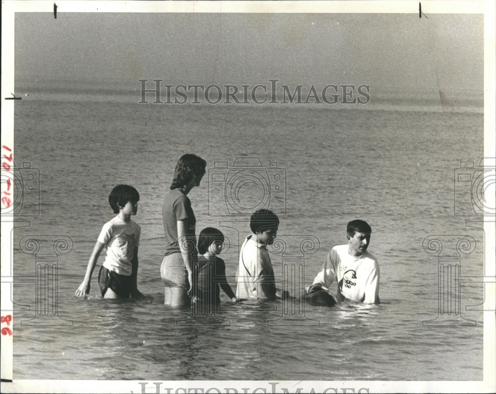 1982 Men With Whales on Redington Beach - Historic Images