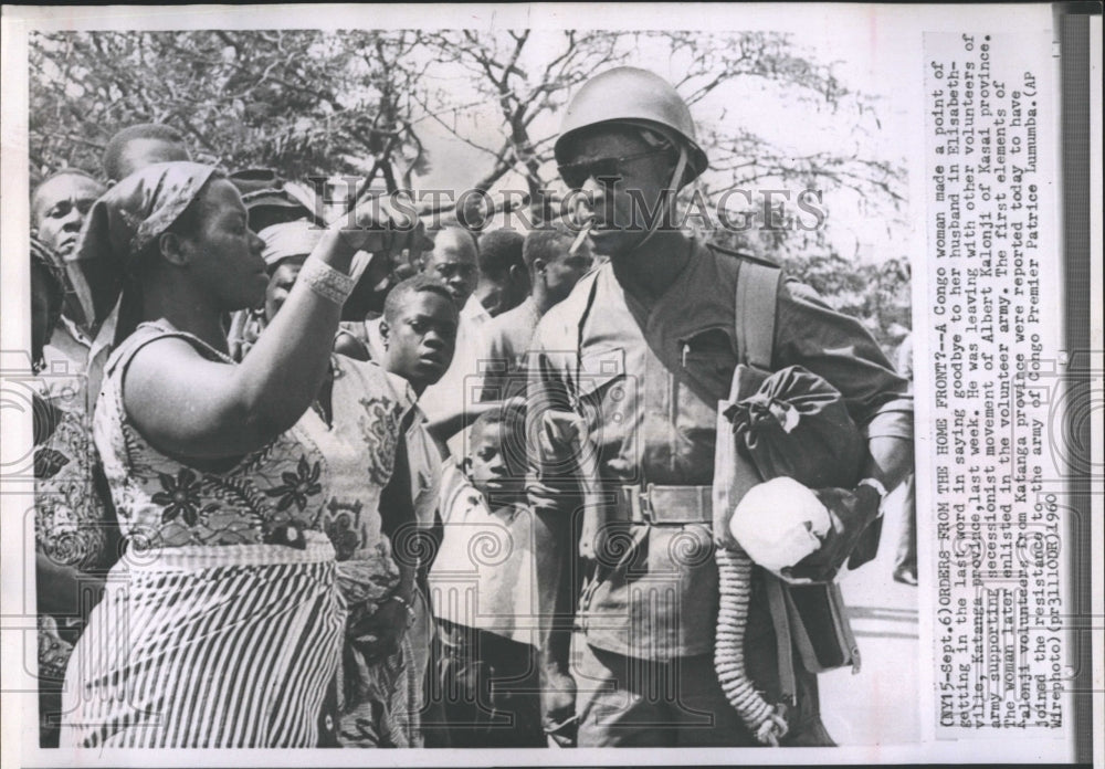 1960 A congo woman saying goodbye to her husband in Katanga province - Historic Images