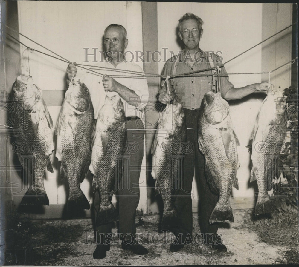 1948 Floyd Redman & Rev. Charles Van Horn Fishermen & their catch - Historic Images