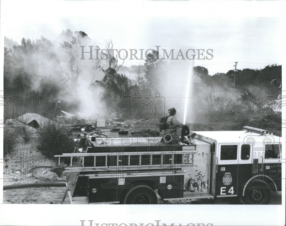 1973 Tampa, FLA Firemen Fight Flames - Historic Images