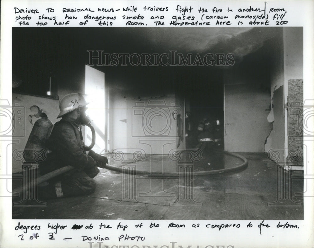 1987 Controlled house burn - Historic Images