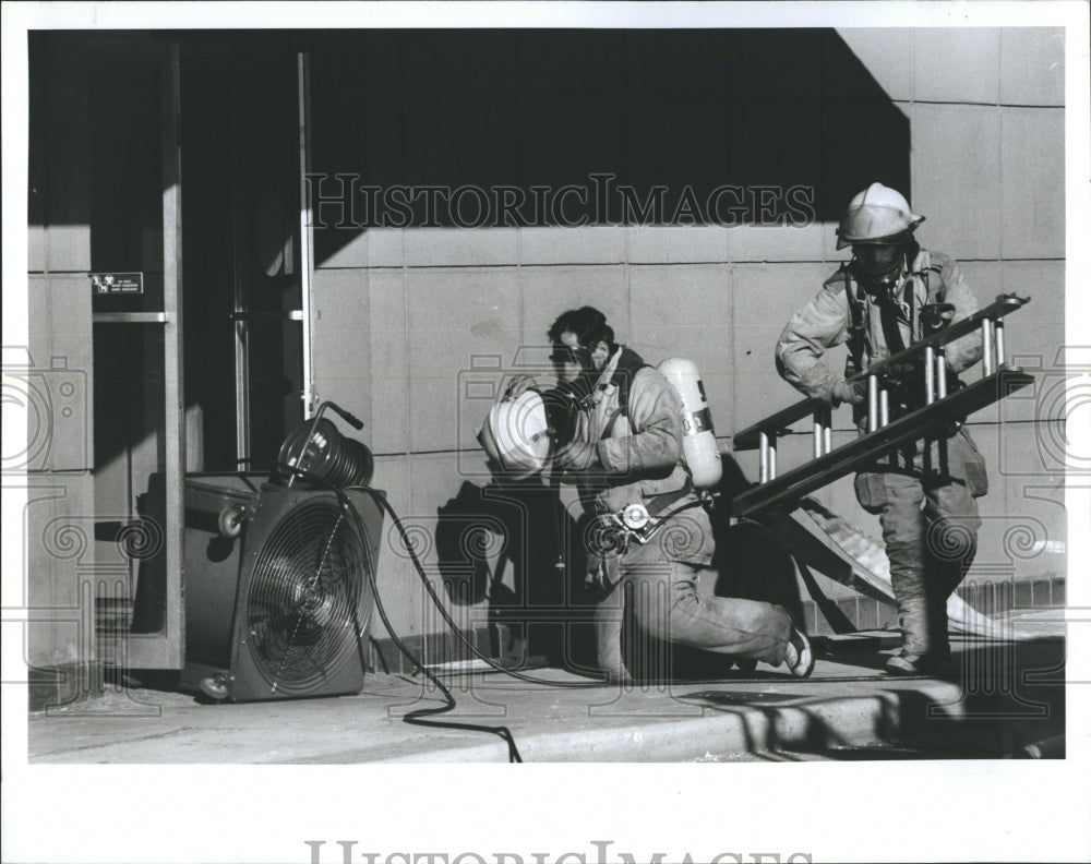 1969 Firefighters work at Community Blood and Plasma Corp. - Historic Images