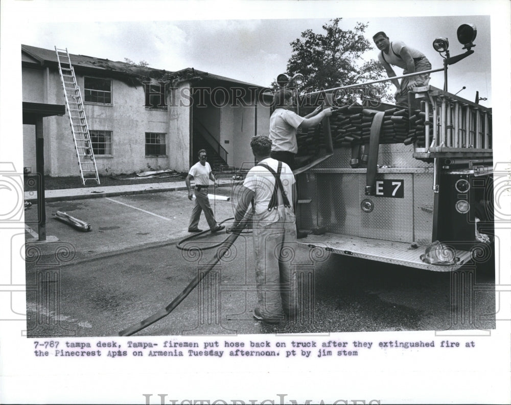 Press Photo Firemen extinguish fire at Pinecrest Apartments in Armenia - Historic Images