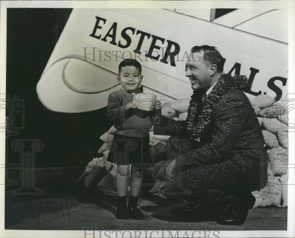 1966 Easter Seal Child Alan Nagao recieves check from Ted Graves - Historic Images