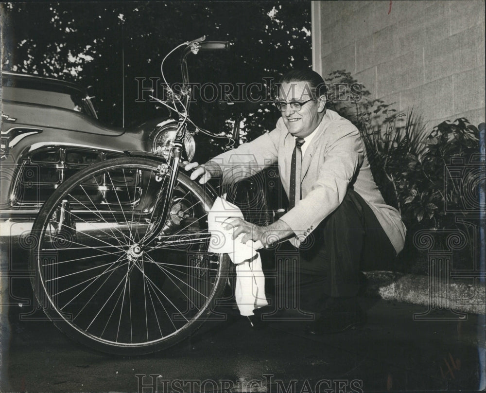 1958 Rev. Fred Martin cleaned the bike - Historic Images