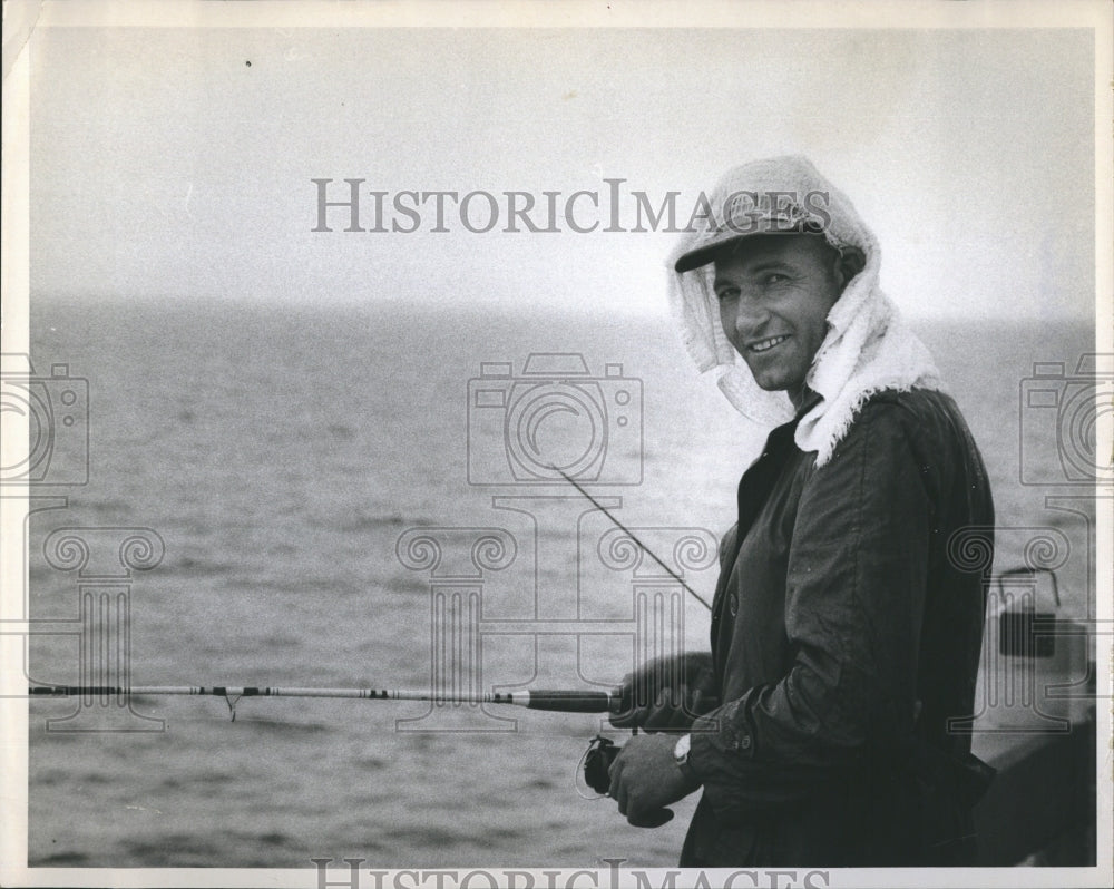 1970 Martin Orin while fishing - Historic Images